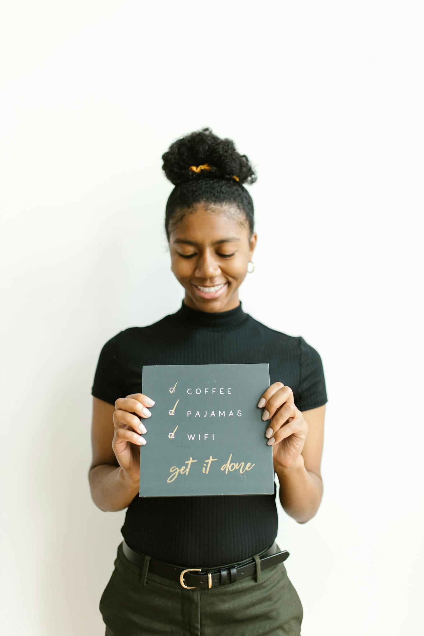 Woman holding a To Do List Board